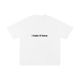 i hate it here. Unisex Pure Cotton T-Shirt
